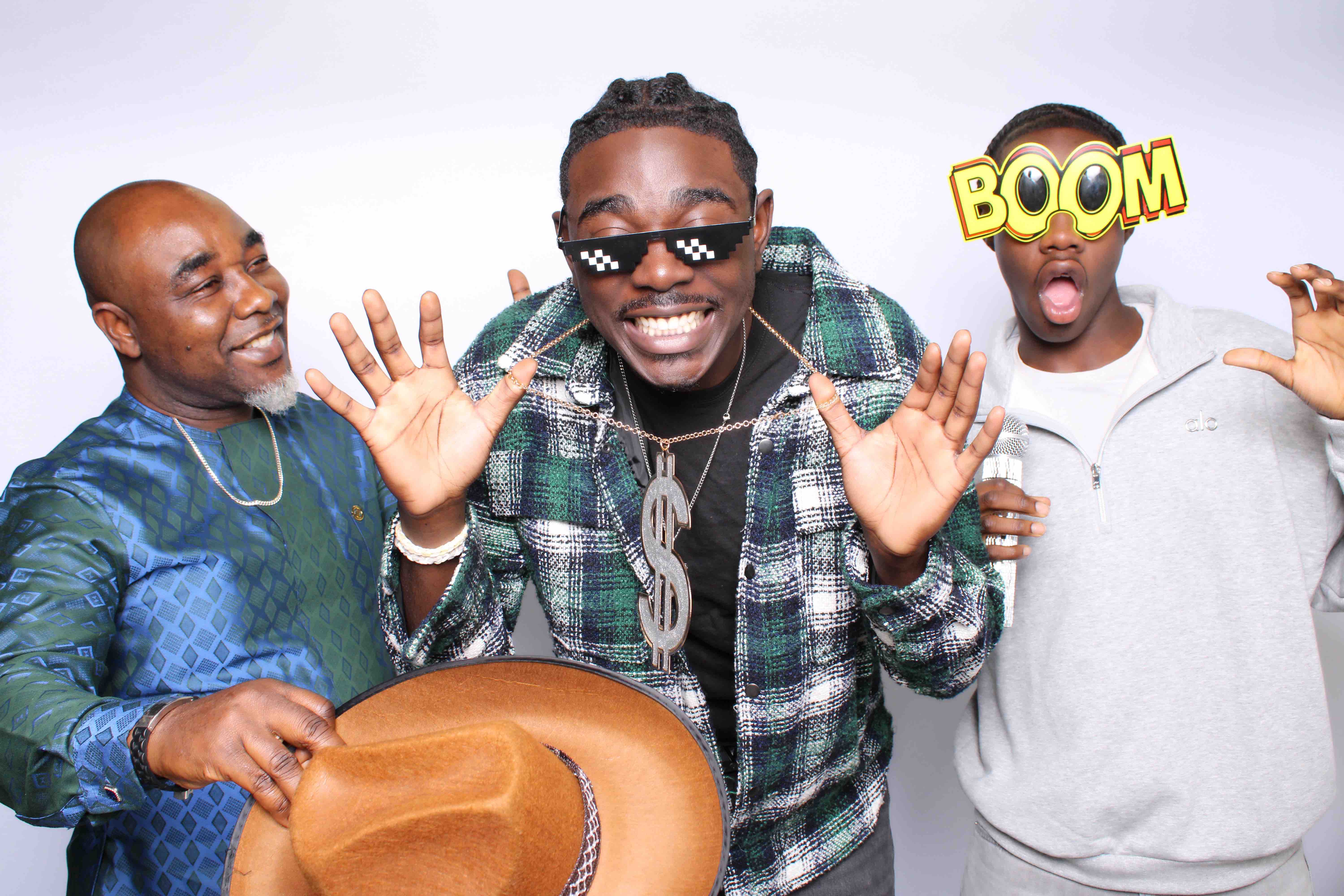 Family posing at the photo booth