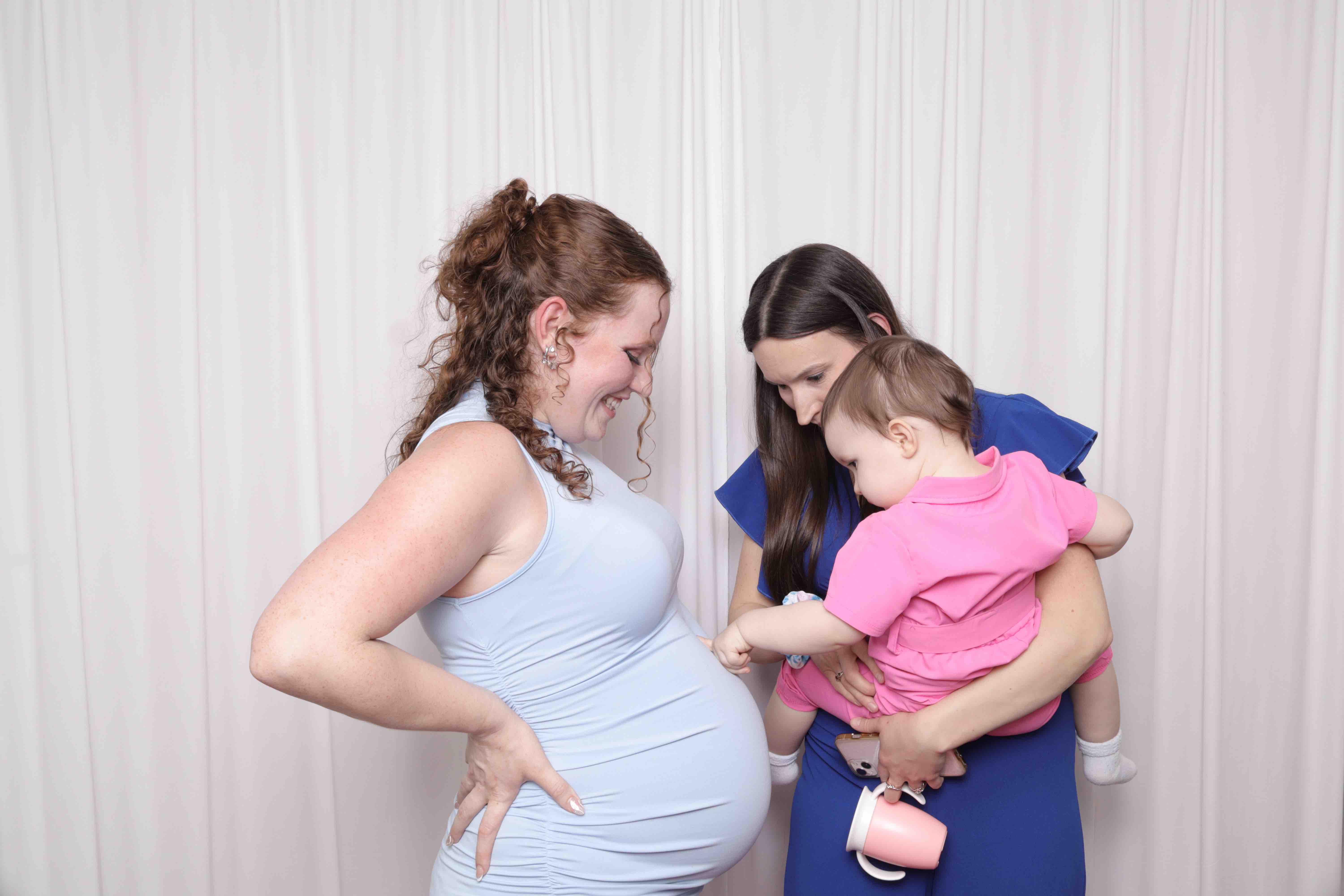 Guest pointing during a celebration photo booth moment