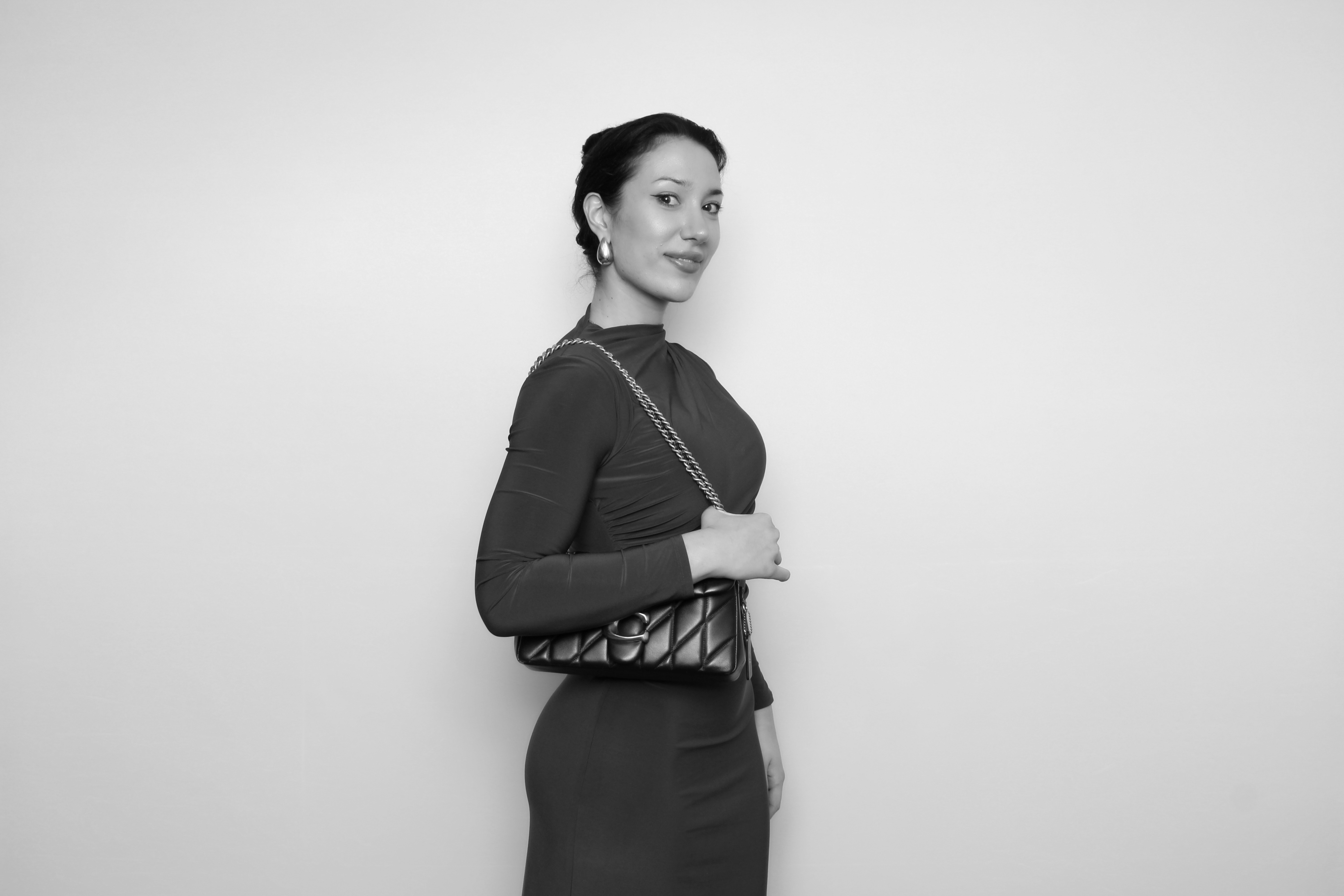 A portrait in black and white glam style.